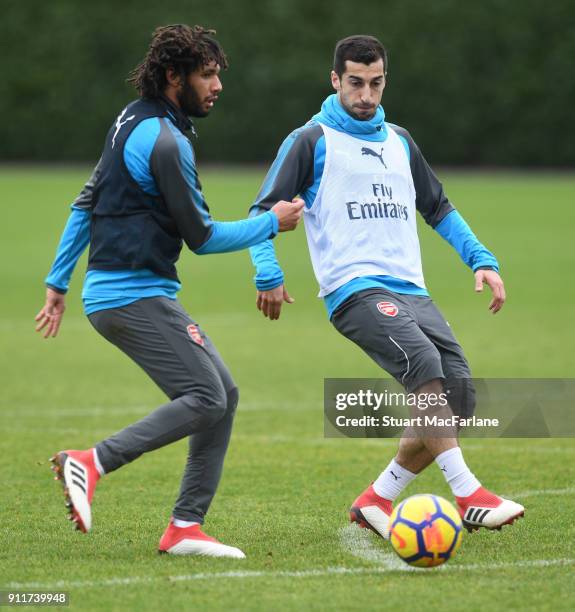 Mohamed Elneny and Henrikh Mkhitaryan of Arsenal during a training session at London Colney on January 29, 2018 in St Albans, England.