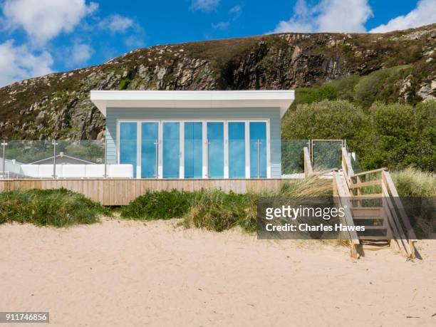 prestige holiday home on warren beach near abersoch:wales coast path on the lleyn peninsula - abersoch stock pictures, royalty-free photos & images