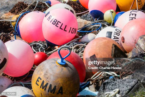 fishing boat buoys at abersoch:wales coast path on the lleyn peninsula - abersoch stock pictures, royalty-free photos & images