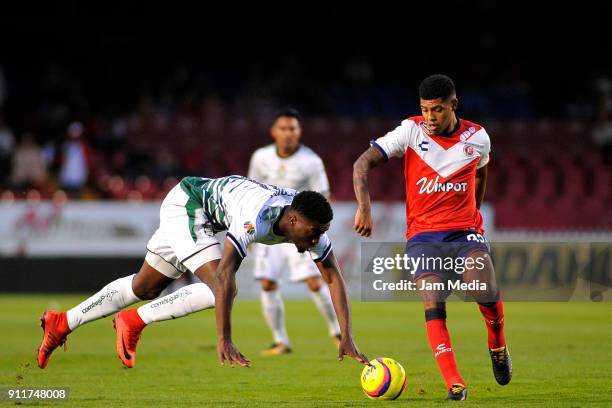 Jorge Tavares of Santos and Wilder Cartagena of Veracruz compete for the ball during the 4th round match between Veracruz and Santos Laguna as part...