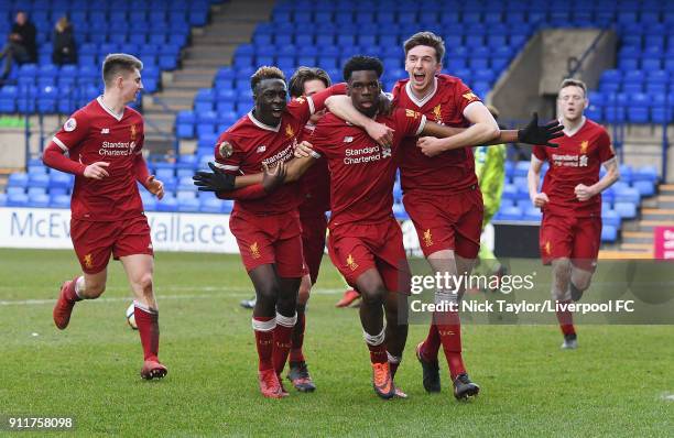 Ovie Ejaria of Liverpool celebrates with his team mates after scoring the opening goal during the Premier League 2 match between Liverpool and Derby...