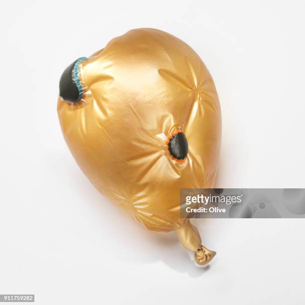 flat balloon repaired with bicycle patchs - makeshift fix stock pictures, royalty-free photos & images