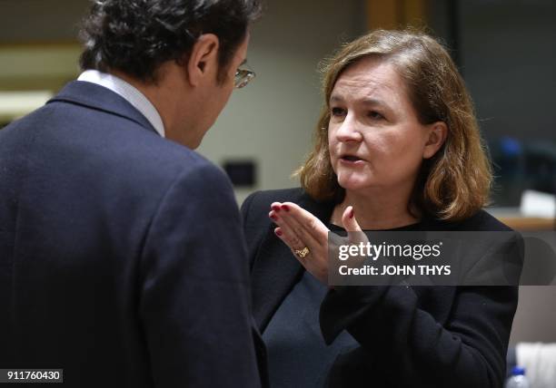 French minister attached to the Foreign Affairs minister Nathalie Loiseau talks with an advisor during a General affairs council concerning article...