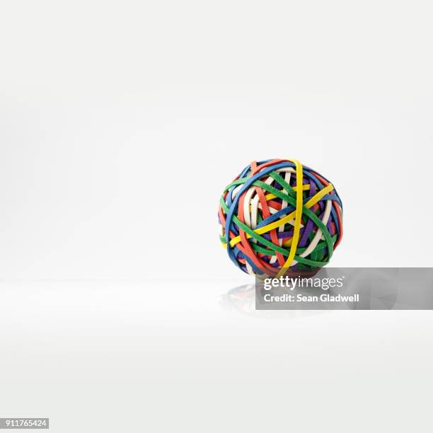 rubber band ball - elastic band ball stock pictures, royalty-free photos & images