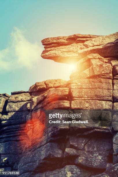 sun rock - rock overhang stock pictures, royalty-free photos & images