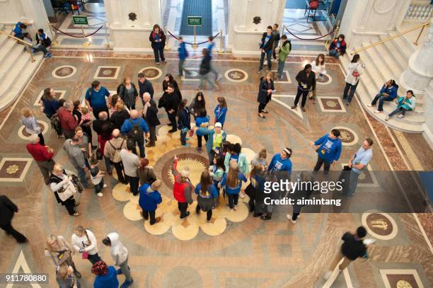group of tourists in the library of congress - library of congress interior stock pictures, royalty-free photos & images
