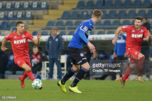 Anas Ouahim of Koeln and Milos Jojic of Koeln battle for the ball during the H-Hotels.com Wintercup match between Arminia Bielefeld and 1.FC Koeln at...