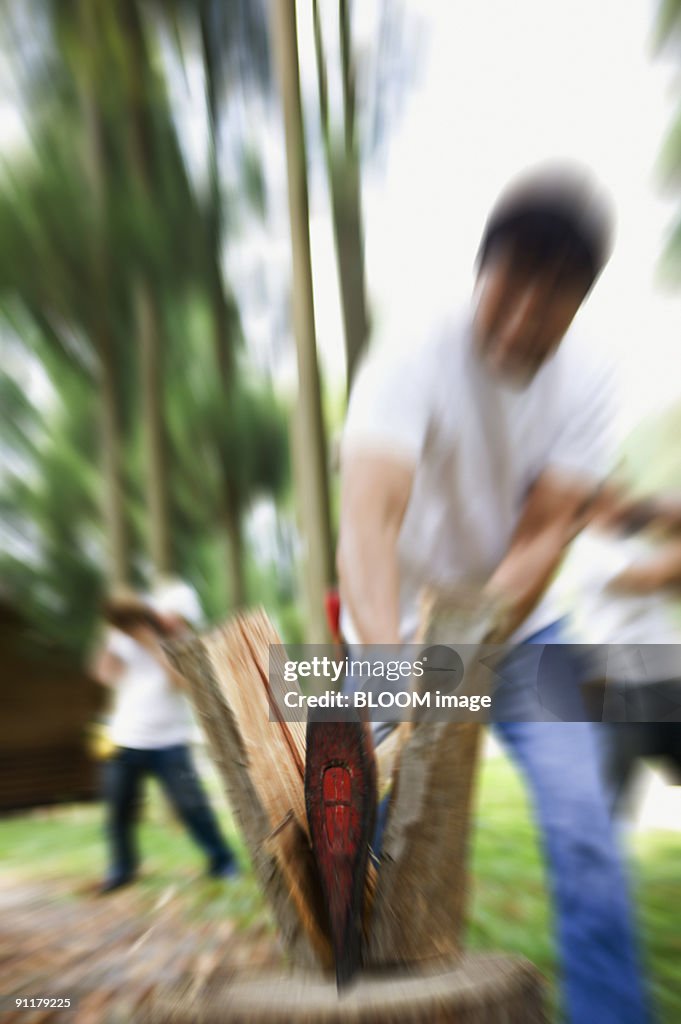 Man splitting wood