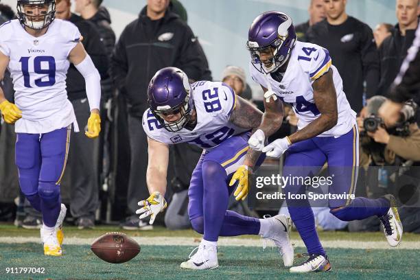 Minnesota Vikings tight end Kyle Rudolph celebrates with Minnesota Vikings wide receiver Stefon Diggs by pretending to play a game of Curling with...