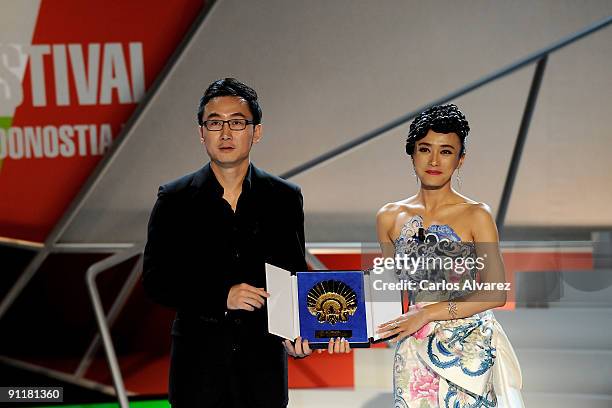 Director Lu Chan and Actress Qin Lan receive the "Golden Shell" award of the 57th San Sebastian Film Festival to the best film, for their film "City...