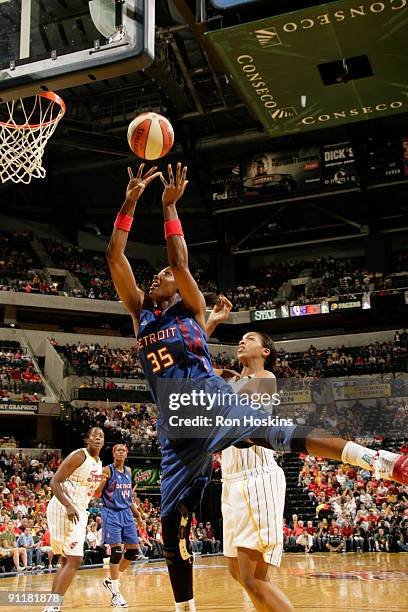 Cheryl Ford of the Detroit Shock shoots over Tammy Sutton-Brown of the Indiana Fever during Game Three of the Eastern Conference Finals at Conseco...