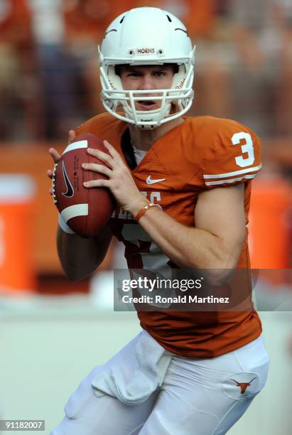 Quarterback Garrett Gilbert of the Texas Longhorns throws against the UTEP Miners at Darrell K Royal-Texas Memorial Stadium on September 26, 2009 in...