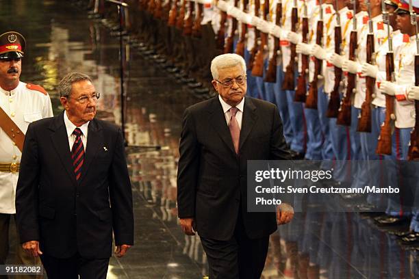 Raul Castro , President of Cuba and brother of Revolution leader Fidel Castro, walks next to Palestinian President Mahmoud Abbas , during the...