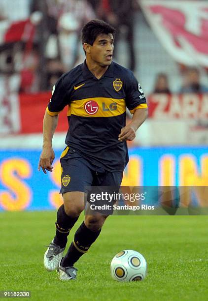 Hugo Ibarra of Boca Juniors runs for the ball during an Argentina's first division soccer match on September 26, 2009 in Buenos Aires, Argentina. .