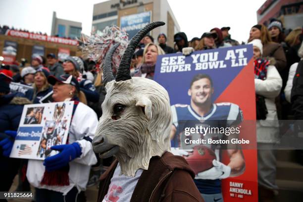 Tara Bolduc, of Epping, NH borrowed her son's Tom Brady Halloween costume for the New England Patriots rally held to send the team off to the Super...