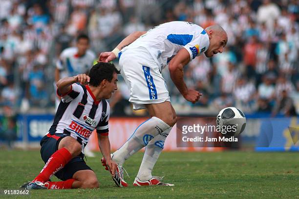 Monterrey Luis Ernesto Perez and Pueblas' Alejandro Acosta during their match in the 2009 Opening tournament, the closing stage of the Mexican...