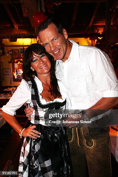 Boxer Henry Maske and his wife Manuela attend the Oktoberfest beer festival at Kaefer Schaenke beer tent on September 26, 2009 in Munich, Germany.