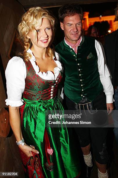 Carsten Maschmeyer and girlfriend Veronica Ferres attend the Oktoberfest beer festival at Kaefer Schaenke beer tent on September 26, 2009 in Munich,...