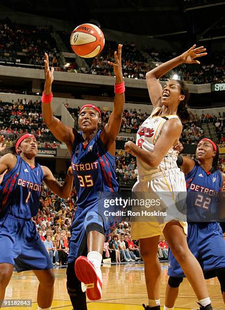 Cheryl Ford of the Detroit Shock battles Tammy Sutton-Brown of the Indiana Fever during Game Three of the WNBA Eastern Conference Finals at Conseco...