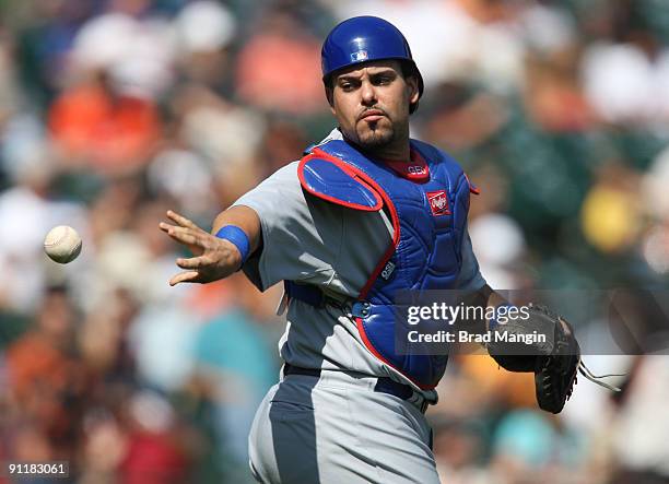 Geovany Soto of the Chicago Cubs works behind the pate against the San Francisco Giants during the game at AT&T Park on September 26, 2009 in San...