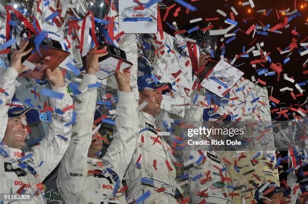 Team Peugeot Total Peugeot drivers Nic Minassian and Pedro Lamy of second place car and Franck Montagny and Stephane Sarrazin of first place car,...