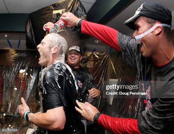 Brendan Ryan is doused by teammates as the St. Louis Cardinals celebrate clinching the National League Central Division after defeating the Colorado...