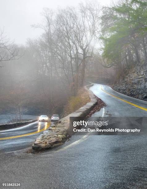 winding road - car crash wall stock pictures, royalty-free photos & images