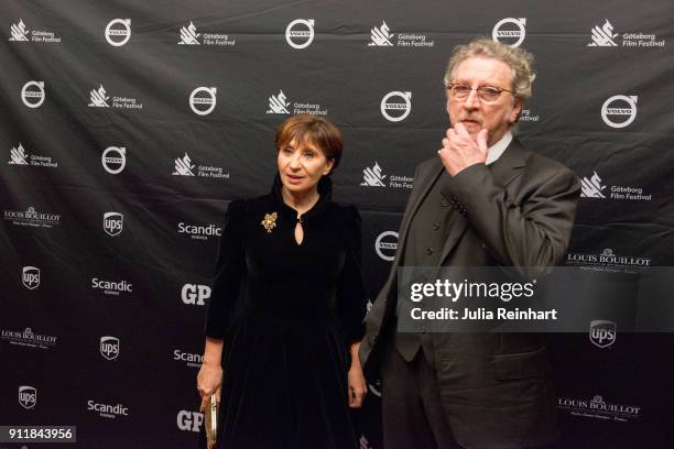 French Director Robert Guediguian and his wife, actress Ariane Ascaride arrive at Draken Film Center during the opening ceremony of the 2018...