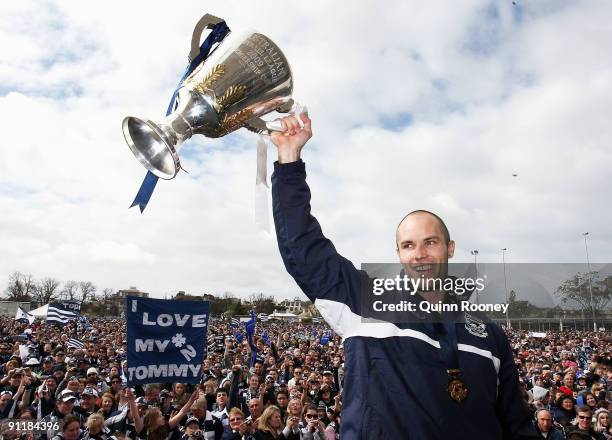 Geelong Cats captain Tom Harley holds the Premiership Cup aloft during the Geelong Cats AFL Grand Final reception at Skilled Stadium on September 27,...