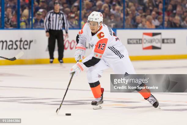 Pacific Division forward Johnny Gaudreau skates in on goal during the first game of the NHL All-Star Game between the Pacific and Central Divisions...