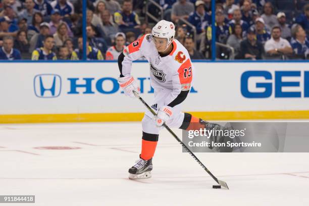 Pacific Division forward Johnny Gaudreau takes a shot during the first game of the NHL All-Star Game between the Pacific and Central Divisions on...
