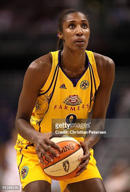 Lisa Leslie of the Los Angeles Sparks shoots a free throw shot against the Phoenix Mercury in Game Two of the Western Conference Finals during the...
