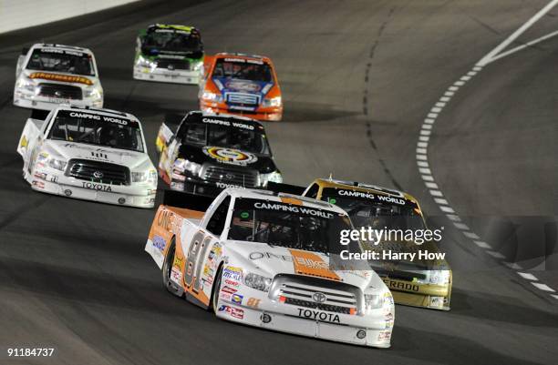 Tayler Malsam driver of the One-Eighty Toyota, leads a group of trucks during the NASCAR Camping World Truck Series Las Vegas 350 at Las Vegas Motor...