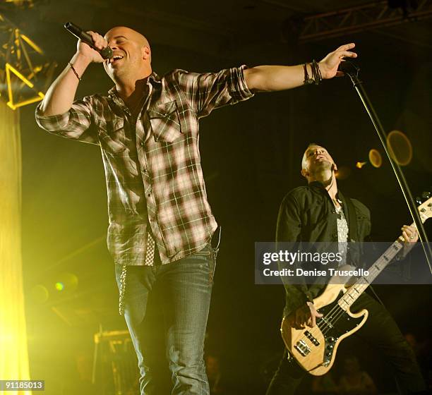 Singer Chris Daughtry and musician Josh Paul of the band Daughtry perform during the 14th annual Andre Agassi Foundation for Education's Grand Slam...