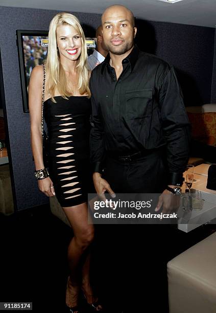 Model Beth Ostrosky and basketball player Derek Fisher pose at Lagasse's Stadium VIP grand opening at The Palazzo on September 25, 2009 in Las Vegas,...