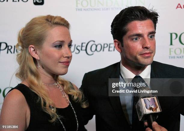 Actors Adrienne Frantz and Scott Bailey attend Point Foundation's "Point Honors... Los Angeles" at the Renaissance Hollywood Hotel on September 26,...