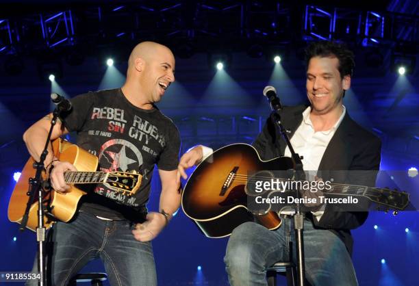 Singer Chris Daughtry of the band Daughtry and comedian/actor Dane Cook perform during the 14th annual Andre Agassi Foundation for Education's Grand...