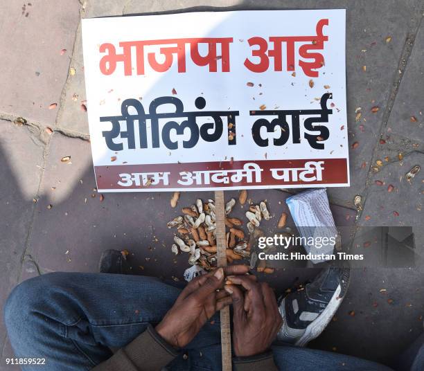 Supporters of Aam Admi Party protest against the ongoing sealing drive in Delhi, at Parliament Street on January 29, 2018 in New Delhi, India....
