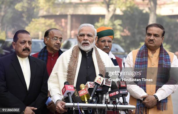 Prime Minister Narendra Modi with parliamentary affairs minister Ananth Kumar, minister of state Jitendra Singh addressing the media on the first day...