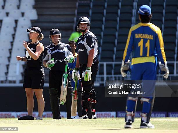Physio Kate Stalker calls for a runner for the injured Jesse Ryder of New Zealand during the ICC Champions Trophy Group B match between New Zealand...