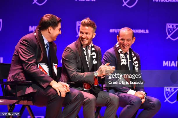 David Beckham with Sprint CEO Marcelo Claure and MLS Commissioner Don Garber during the press conference announcing an MLS franchise in Miami at the...