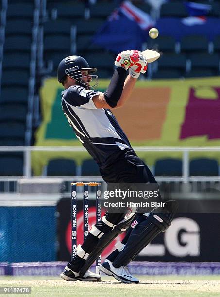 Daniel Vettori of New Zealand lifts a delivery over third man for six during the ICC Champions Trophy Group B match between New Zealand and Sri Lanka...