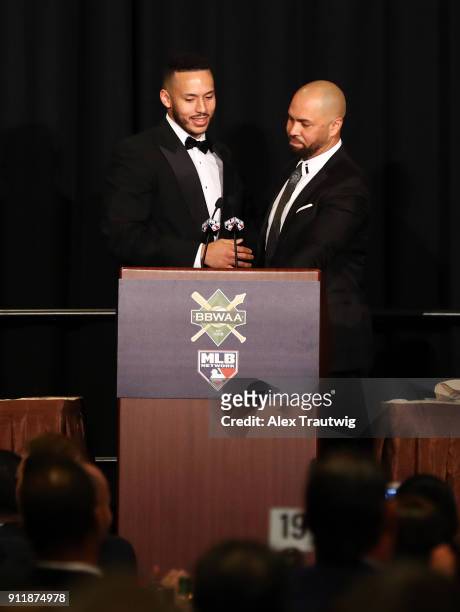 Carlos Beltran introduces Carlos Correa during the 2018 Baseball Writers' Association of America awards dinner on Sunday, January 28, 2018 at the...