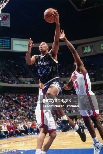 Anthony Avent of the Orlando Magid shoots during a game played on December 12, 1994 at the Continental Airlines Arena in East Rutherford, New Jersey....