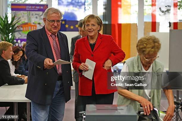 Chancellor Angela Merkel of the Christian Democratic Union party arrives for casting her ballot for German federal elections on September 27, 2009 in...