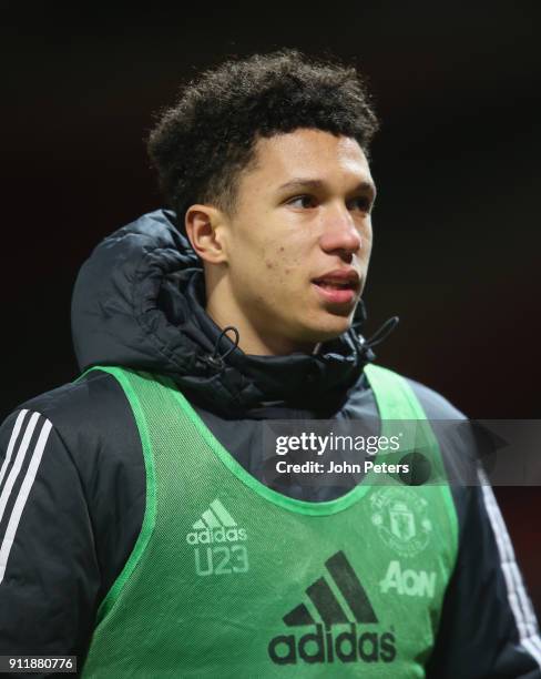 Nishan Burkart of Manchester United U23s warms up during the Premier League 2 match between Manchester United U23s and Tottenham Hotspur U23s at Old...