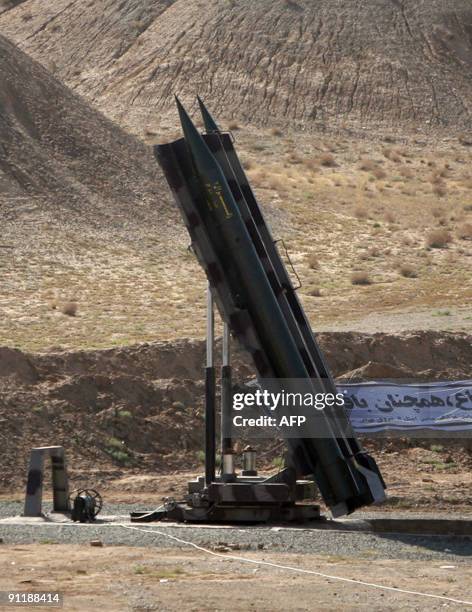 Iranian short-range missile is prepared to be test-launched during war games in Qom, 120 kms south of Tehran, on September 27, 2009. Iran test-fired...