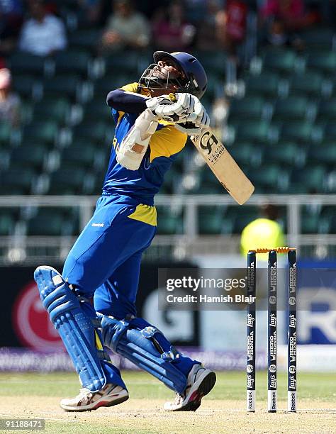 Tillakaratne Dilshan of Sri Lanka skies a ball and is caught out during the ICC Champions Trophy Group B match between New Zealand and Sri Lanka...