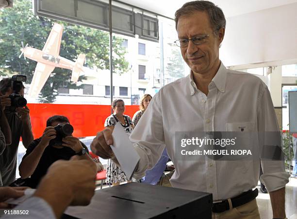 Francisco Louca, leader of the Left Bloc, casts his ballot at a polling station in downtown Lisbon, on 27 September, 2009. Portugal vote today to...