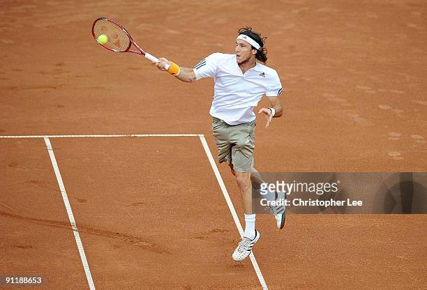 Juan Monaco of Argentina in action against Albert Montanes of Spain during the Final match of the BCR Open Romania at the BNR Arena on September 27,...